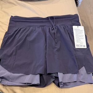 Lululemon Fast and free multi pocket run short 5” NWT